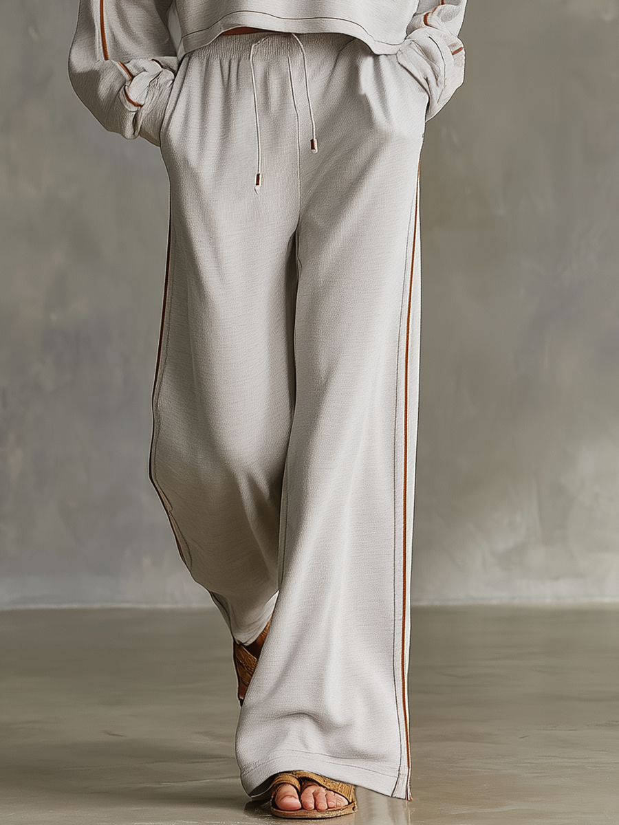 Grey Athleisure Set With A Retro, Casual, And Elegant Style