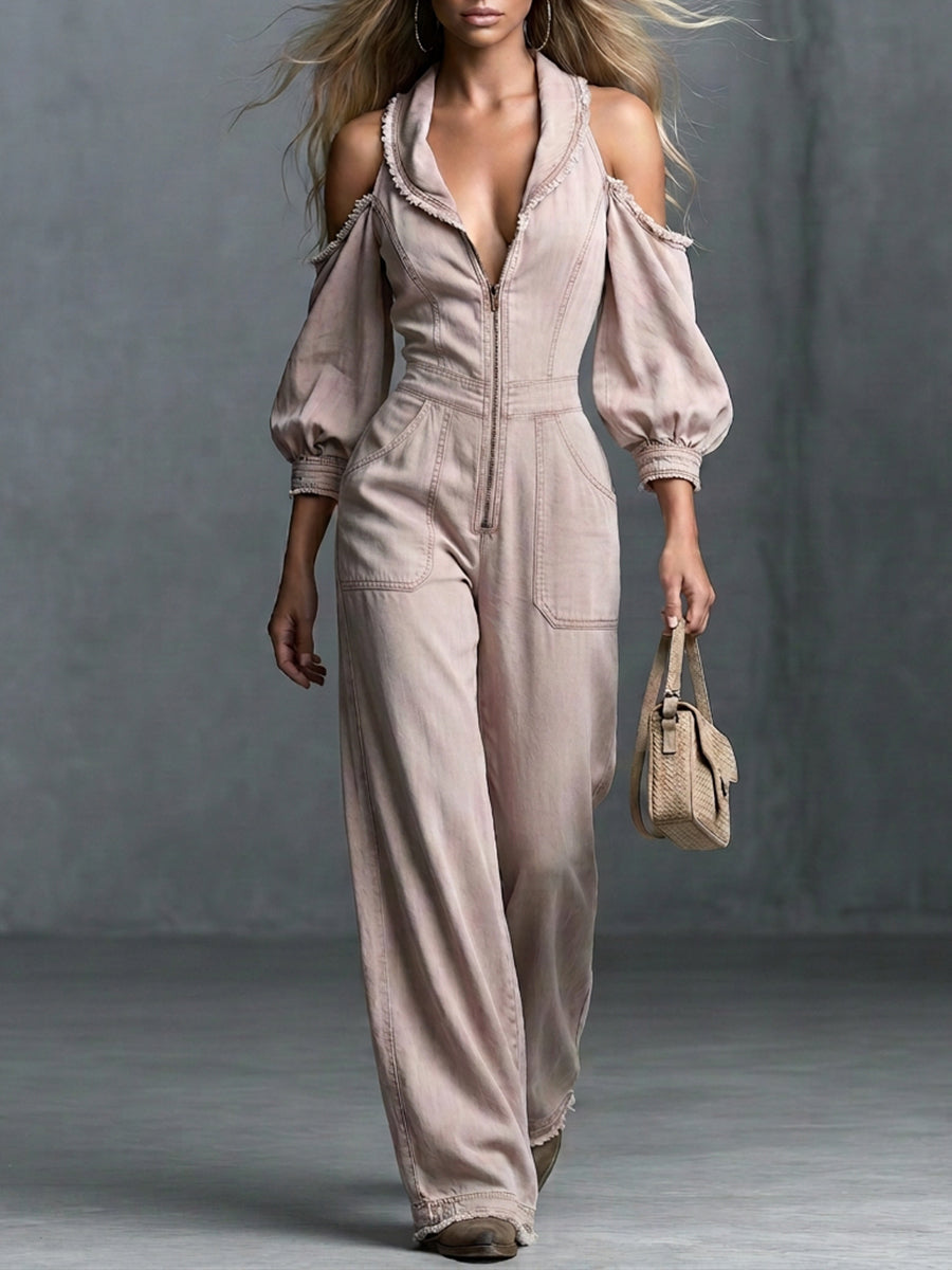 This Washed, Distressed Denim Jumpsuit In A Nude-pink Hue Features A Collared Deep V-neck Off-the-shoulder Design Puff Sleeves And A Front Zipper