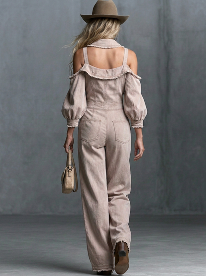 This Washed, Distressed Denim Jumpsuit In A Nude-pink Hue Features A Collared Deep V-neck Off-the-shoulder Design Puff Sleeves And A Front Zipper