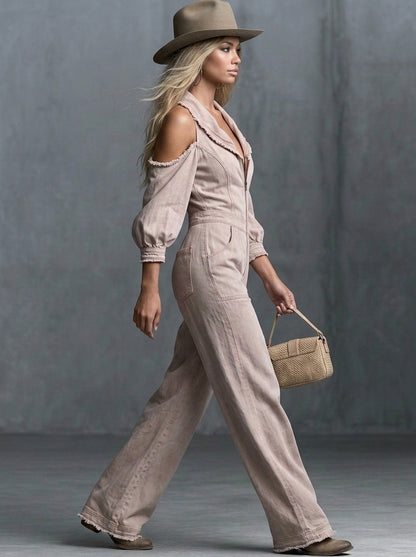 This Washed, Distressed Denim Jumpsuit In A Nude-pink Hue Features A Collared Deep V-neck Off-the-shoulder Design Puff Sleeves And A Front Zipper
