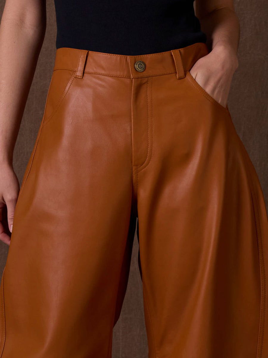 High-end Stylish Pumpkin-colored Faux Leather Curved Pants